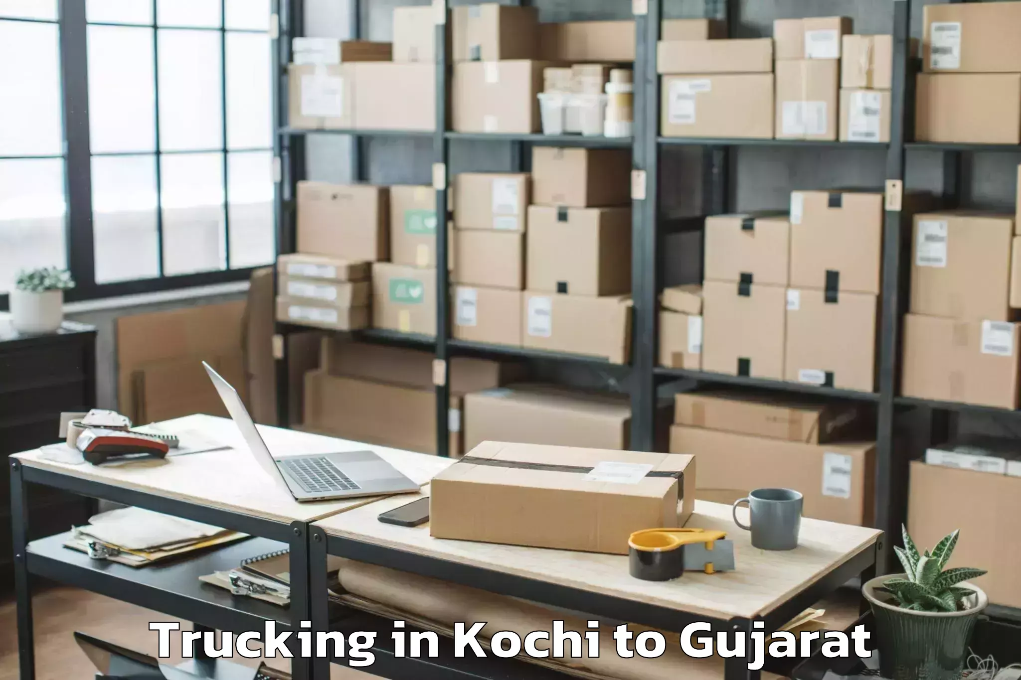 Top Kochi to Gussar Trucking Available